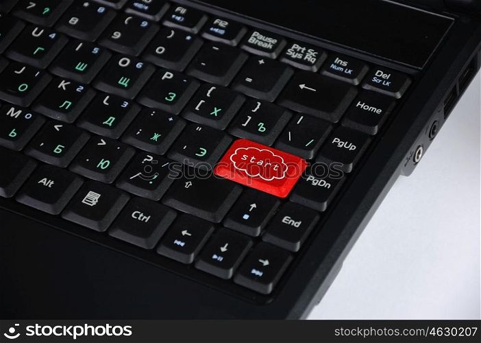 Computer keyboard with word start on it