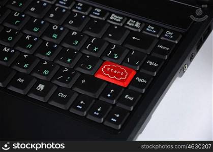 Computer keyboard with word start on it