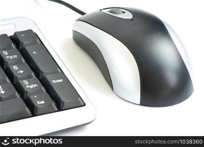 Computer mouse and keyboard isolated on white