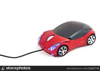 Computer mouse in form toy red sports car with glow headlights isolated on white background