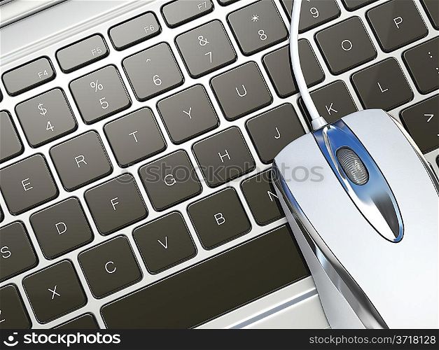 Computer mouse on laptop keyboard. Three-dimensioanl close-up image.