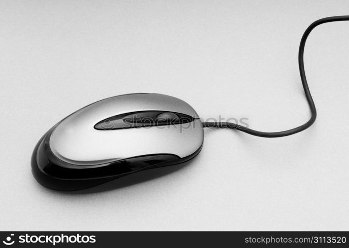 Computer mouse on the background - Technology concept