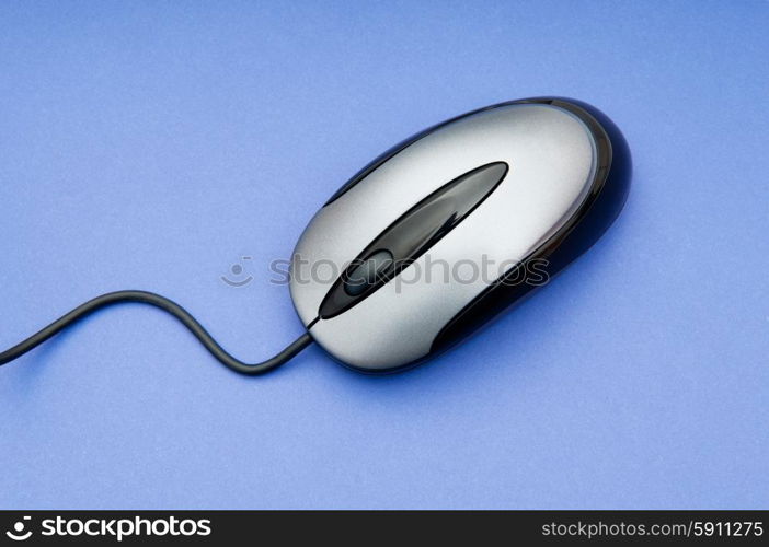 Computer mouse on the background - Technology concept