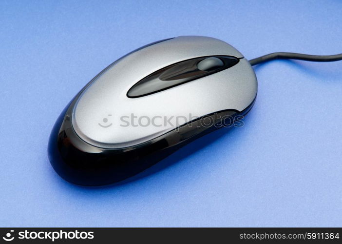 Computer mouse on the background - Technology concept