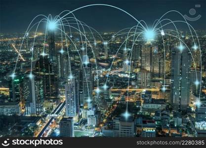 Computer Network connection line between building over Scene of Panorama of Bangkok cityscape which have Modern building and river side at night time, Connectivity and global networks concept
