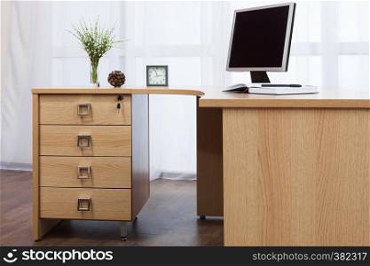 computer on desk in a modern office