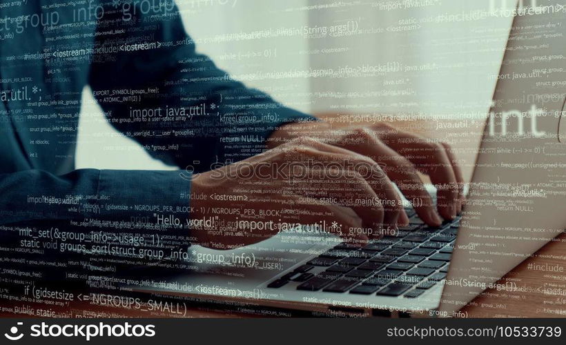 Computer programmer uses capable laptop computer to develop programming code of new software . Computer specialist working on future coding application for software programming development .. Computer programmer uses capable laptop computer to develop programming code