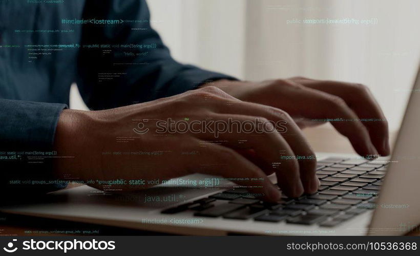 Computer programmer uses capable laptop computer to develop programming code of new software . Computer specialist working on future coding application for software programming development .. Computer programmer uses capable laptop computer to develop programming code