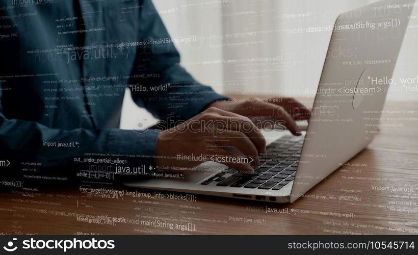 Computer programmer uses capable laptop computer to develop programming code of new software . Computer specialist working on future coding application for software programming development .. Computer programmer uses capable laptop computer to develop programming code