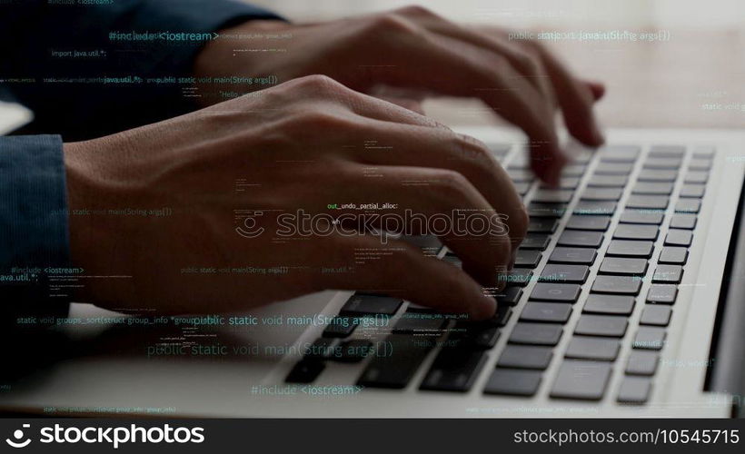 Computer programmer uses capable laptop computer to develop programming code of new software . Computer specialist working on future coding application for software programming development .. Computer programmer uses capable laptop computer to develop programming code