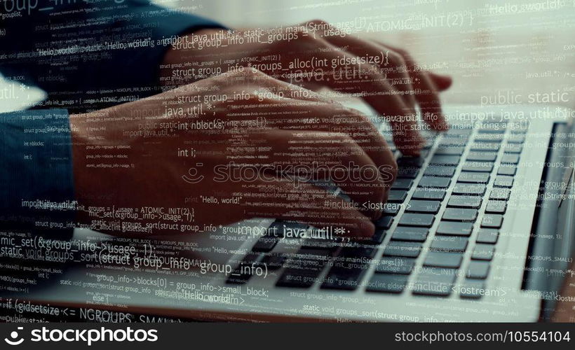 Computer programmer uses capable laptop computer to develop programming code of new software . Computer specialist working on future coding application for software programming development .. Computer programmer uses capable laptop computer to develop programming code