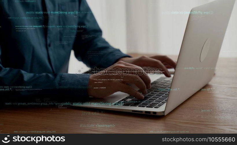Computer programmer uses capable laptop computer to develop programming code of new software . Computer specialist working on future coding application for software programming development .. Computer programmer uses capable laptop computer to develop programming code