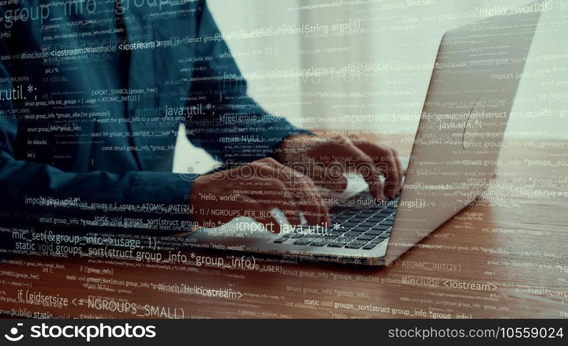 Computer programmer uses capable laptop computer to develop programming code of new software . Computer specialist working on future coding application for software programming development .. Computer programmer uses capable laptop computer to develop programming code