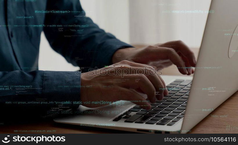 Computer programmer uses capable laptop computer to develop programming code of new software . Computer specialist working on future coding application for software programming development .. Computer programmer uses capable laptop computer to develop programming code