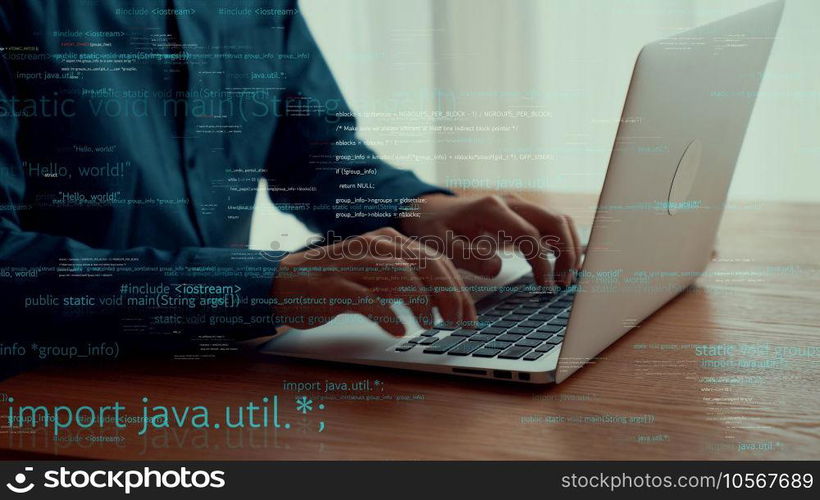 Computer programmer uses capable laptop computer to develop programming code of new software . Computer specialist working on future coding application for software programming development .. Computer programmer uses capable laptop computer to develop programming code