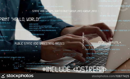 Computer programmer uses capable laptop computer to develop programming code of new software . Computer specialist working on future coding application for software programming development .. Computer programmer uses capable laptop computer to develop programming code