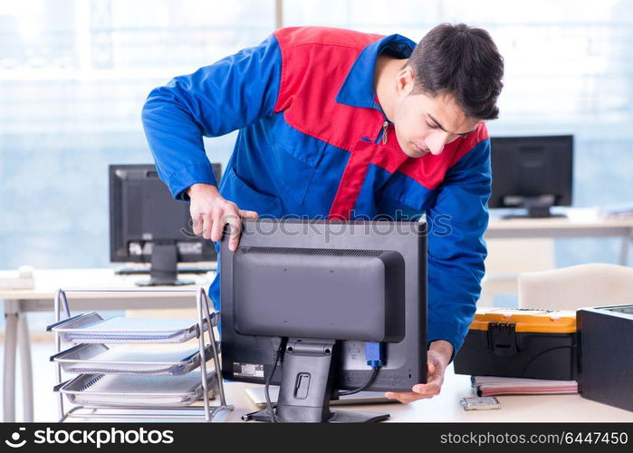 Computer repairman specialist repairing computer desktop