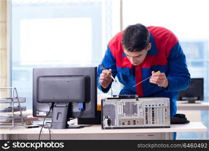 Computer repairman specialist repairing computer desktop