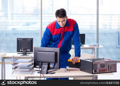 Computer repairman specialist repairing computer desktop