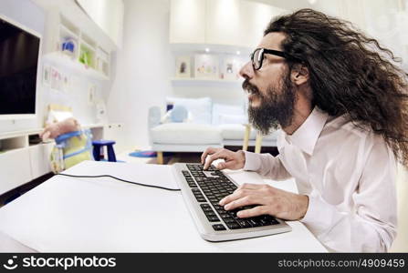 Computer specialist working in a bright office