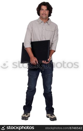 Computer technician holding monitor