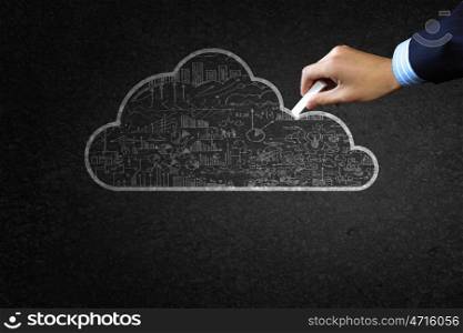 Computing concept. Close up of hand drawing cloud computing concept with chalk