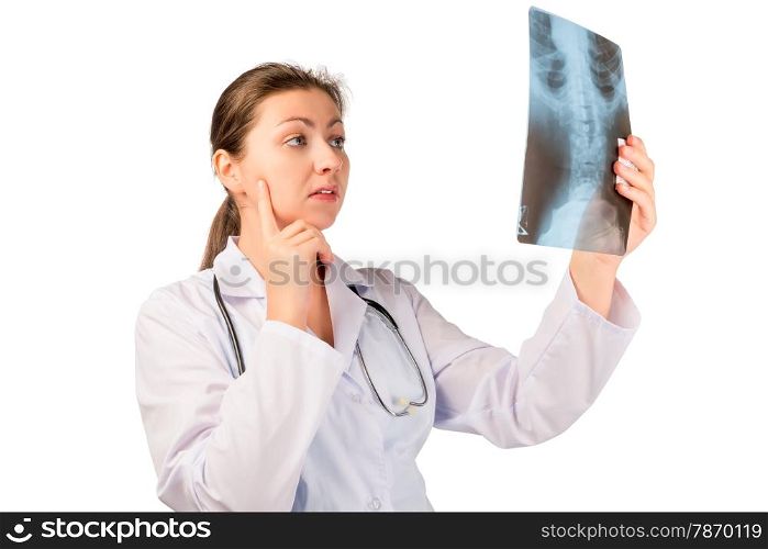 concentrated doctor radiologist examines the picture of the patient
