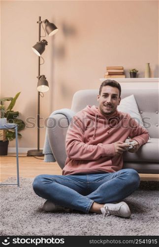 concentrated man floor playing games