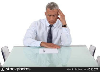 Concentrated man reading a document