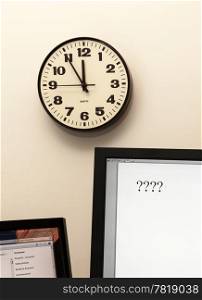 Concept for urgent decision making with clock on paper and question mark on pad