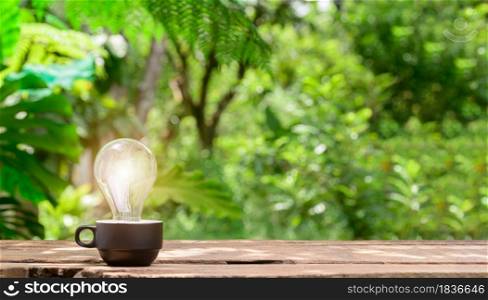 Concept Idea Light Bulb Emitting Bokeh Background