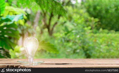 Concept Idea Light Bulb Emitting Bokeh Background