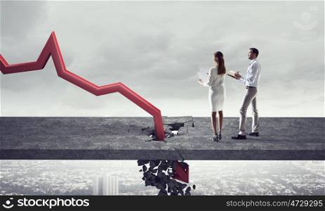 Concept of business collapse. Businesspeople and red decreasing arrow breaking through floor