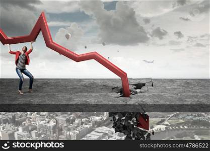 Concept of business collapse. Businesswoman and red decreasing arrow breaking through floor