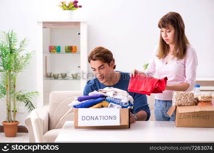 Concept of charity with donated clothing. The concept of charity with donated clothing