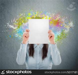 Concept of creative idea of a businesswoman. Colorful splashes streaming out of her. No head. Copyspace