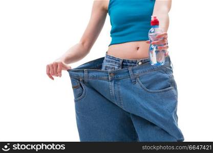 Concept of dieting with oversized jeans