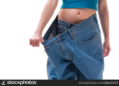 Concept of dieting with oversized jeans