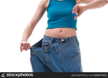 Concept of dieting with oversized jeans. The concept of dieting with oversized jeans