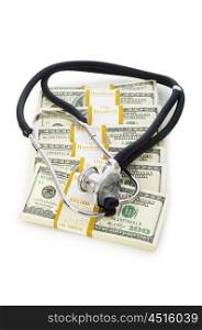 Concept of expensive healthcare with dollars and stethoscope