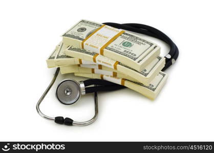 Concept of expensive healthcare with dollars and stethoscope