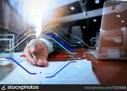 Concept of focus on target with digital diagram.double exposure of businessman or salesman handing over a contract on wooden desk