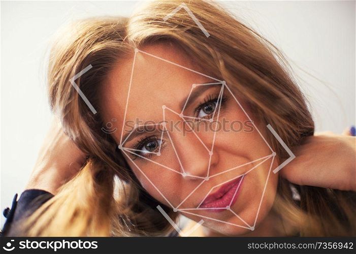 Concept of futuristic and technological scanning of the face of a woman for facial recognition.. scanning of the face of a woman