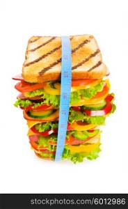 Concept of healthy food with tape measure and sandwich