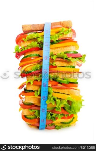 Concept of healthy food with tape measure and sandwich