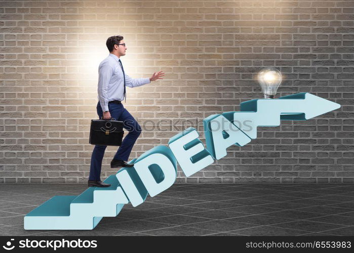 Concept of idea with businessman climbing steps stairs