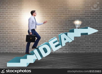 Concept of idea with businessman climbing steps stairs