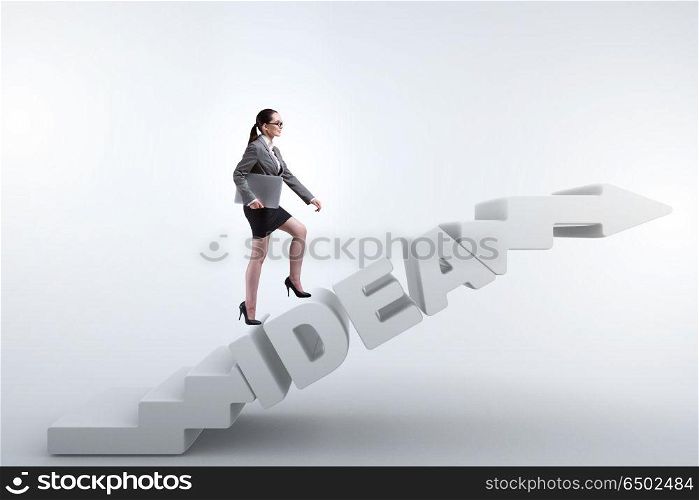 Concept of idea with businesswoman climbing steps stairs