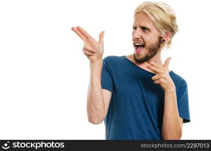 Concept of joy, positive emotion. Happy joyful young man, stylish bearded male smiling laughing, pointing with fingers, isolated on white. young man laughing pointing with fingers