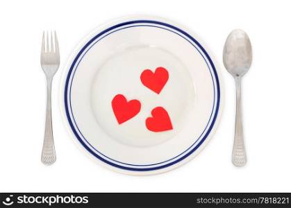 Concept of love - arrangement for dinner with heart shapes in the plate